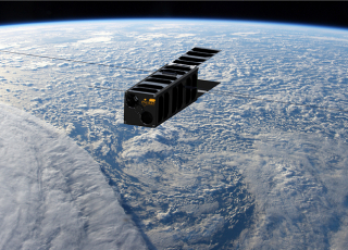 Vue du nanosatellite PicSat dans l'espace. Développé par Observatoire de Paris PSL